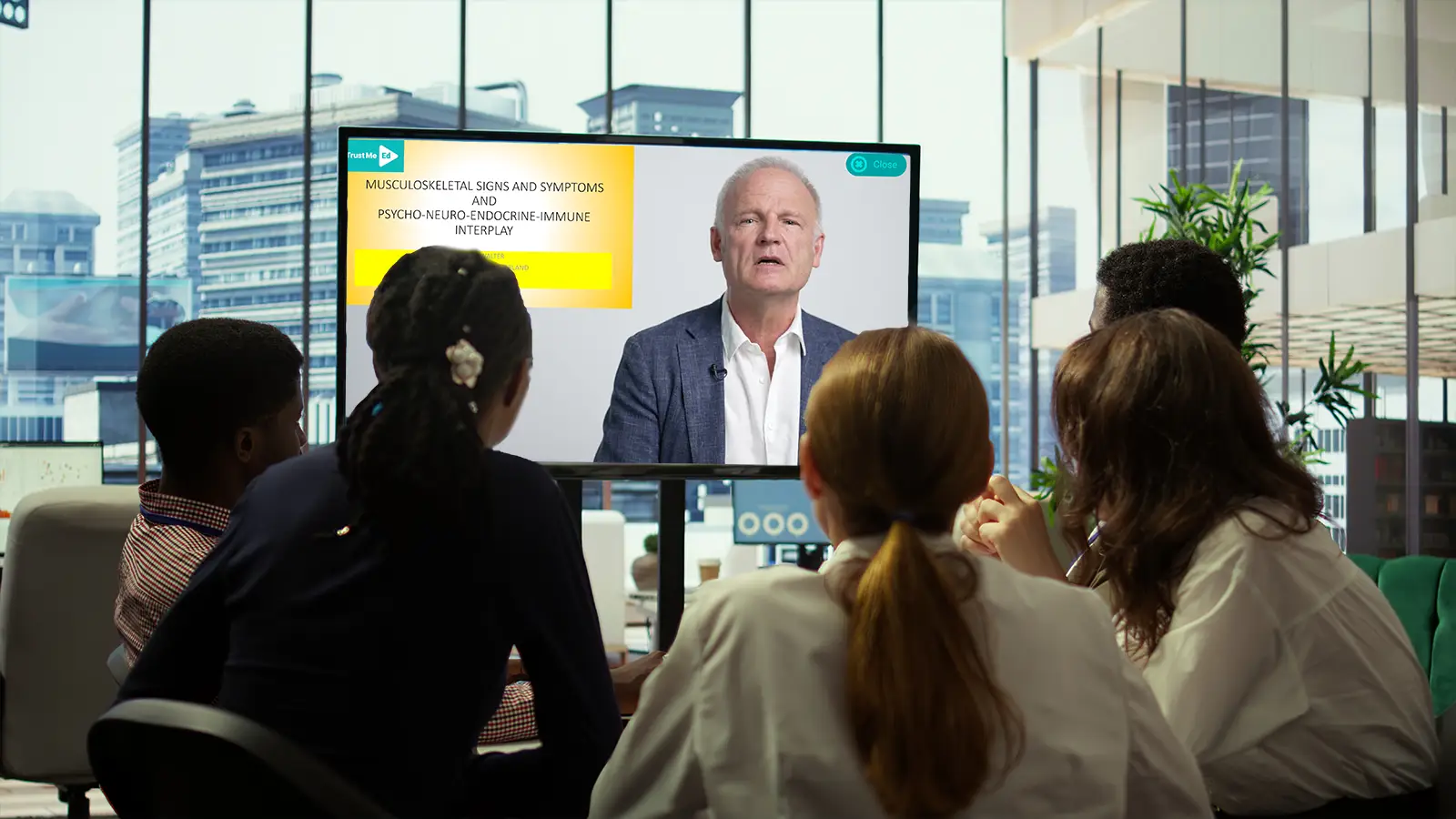 A clinician watching a masterclass